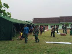 Puluhan Babinsa jajaran kodim 0812 Lamongan dan Prajurit Yonif TP 887/KJM Bersinergi Kerja Bakti di Marshalling Area Ngimbang